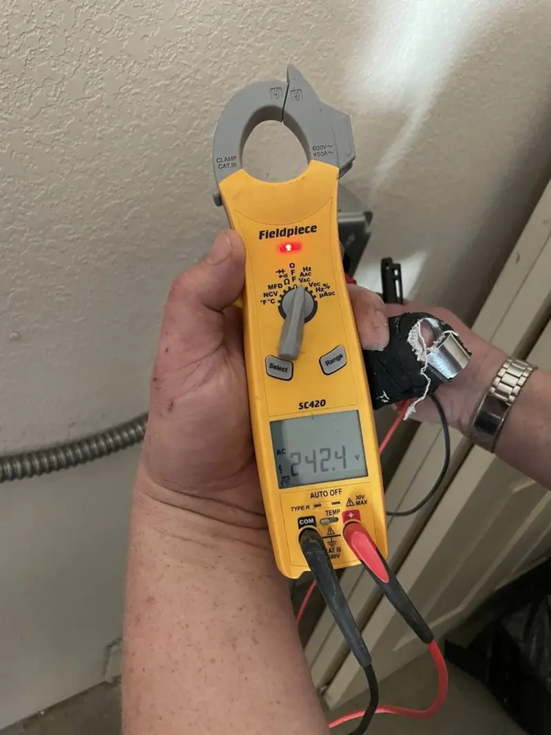Voltage testing with clamp meter during Electrical Installation Services in Walnut Creek